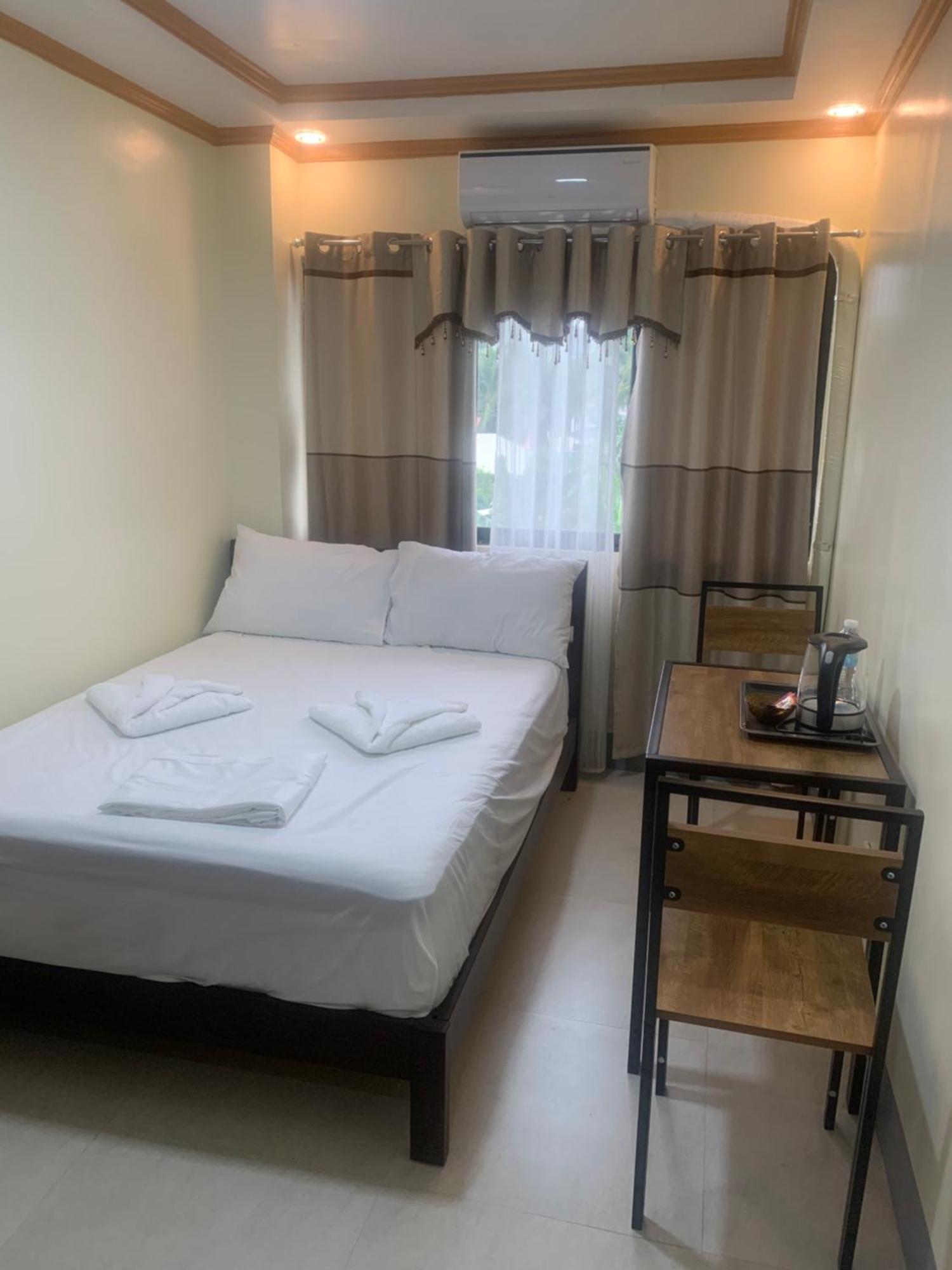 Zl Travelers Inn Batuan Kültér fotó